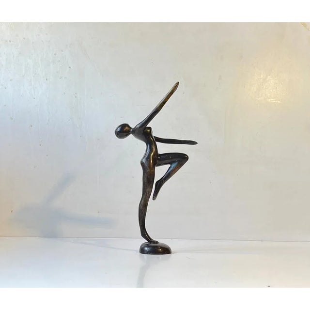 Unusual androgynous sculpture in patinated bronze. Female body and expression-blank facial features. Unknown Scandinavian...