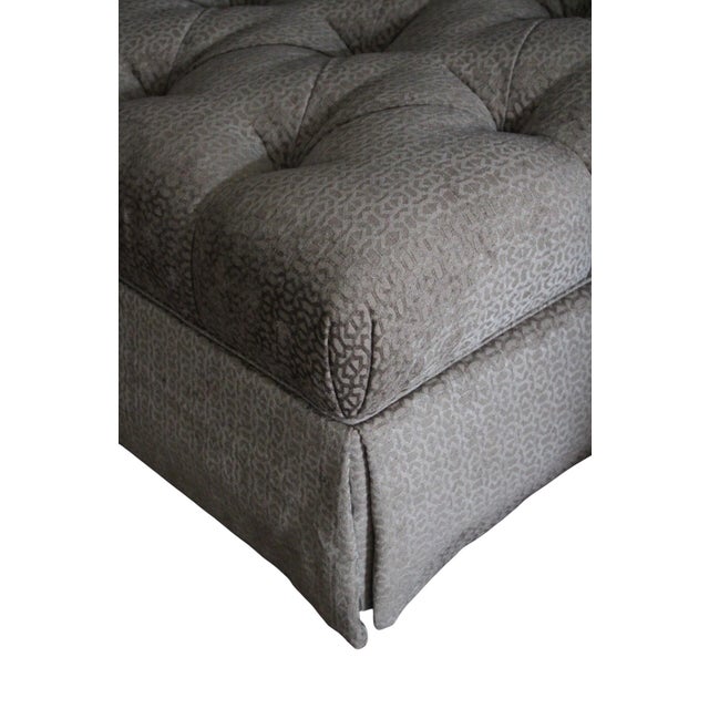 Elevate your living space with this beautifully crafted Lillian August custom ottoman, featuring a generous 42-inch square...