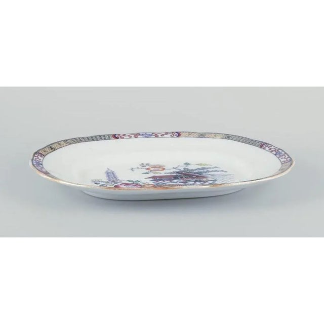 Rörstrand, large oval ‘Japan’ dish made of faience. Classic oriental decoration, Japanese motifs. Early 20th century....