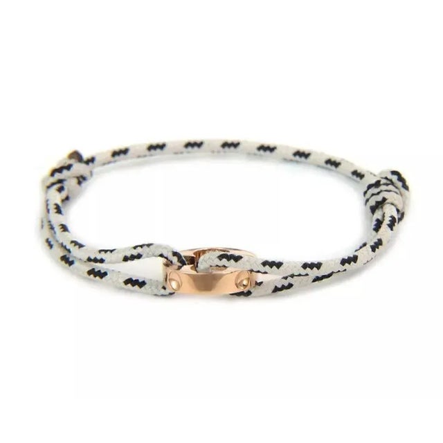 Contemporary Louis Vuitton France Empreinte 18k Pink Gold Charm Black & White Cord Bracelet For Sale - Image 3 of 5