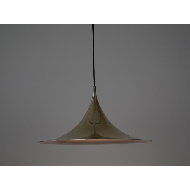 The Semi lamp was designed in 1968 as the result of a creative partnership between Claire Bonderup and Torsten Thorup....