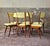 Splendid set of six dining chairs made in the 1950s and attributed to designer Carlo de Carli. Beech wood frame and yellow...