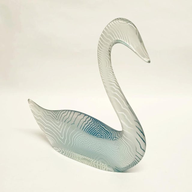 A large Abraham Palatnik (Brazil) swan sculpture with white abstract print encased in a transparent body, giving a light...