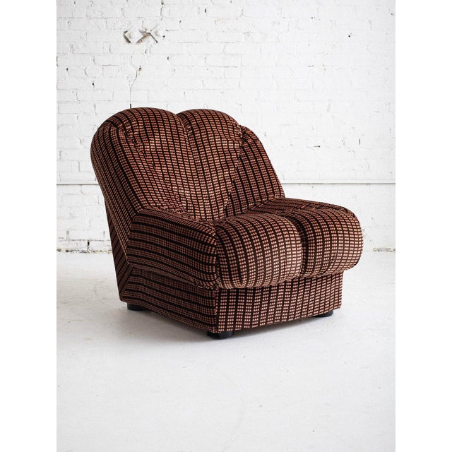 A space age Italian lounge chair with original peach and brown cut-velvet upholstery. Flower or petal form silhouette....