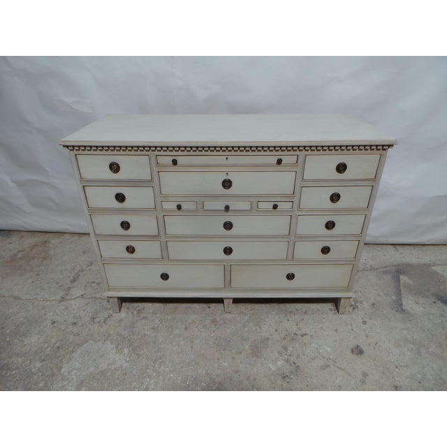 This is a unique Gustavian Style 17 drawer chest of drawers.