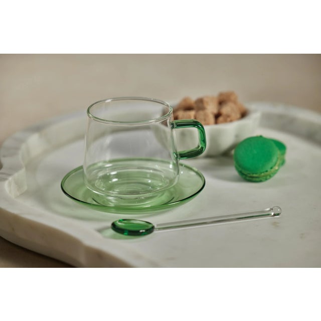 This beautiful set adds a touch of elegance and sophistication to any table setting. The color is reminiscent of nature...