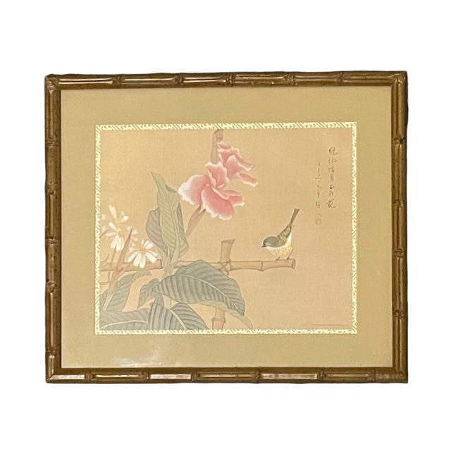 Charming set of three vintage Asian-inspired framed prints, each featuring delicate birds perched among flowering branches...