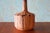 A monumental ceramic table lamp featuring a light pink, taupe and brown colorway of drip lava glaze. Heavy and Tall coming...