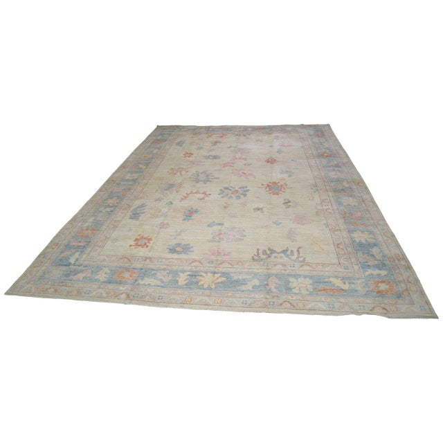 Hand-knotted with care using traditional rug-making techniques, this wool rug blends timeless craftsmanship with a modern...