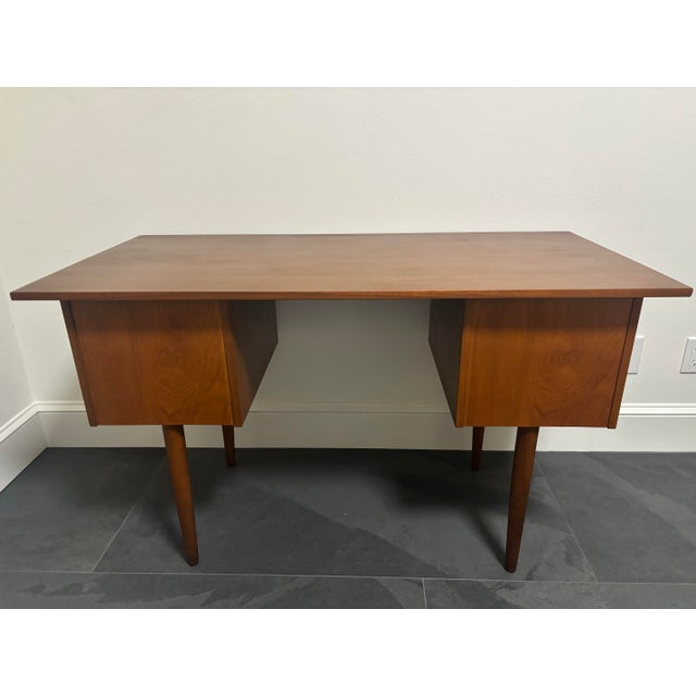 Selling a mid century teak desk. It has 6 dovetailed drawers, all in good working order. This desk has been beautifully...