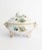 This spectacular Roco Revival hand-painted porcelain tureen by Nymphenburg features a gilded rim, a blue and green floral...