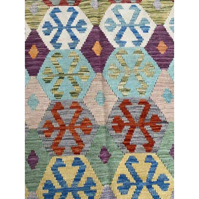 Vibrant Hand-Woven Kilim Rug With Intricate Geometric Patterns For Sale - Image 6 of 8