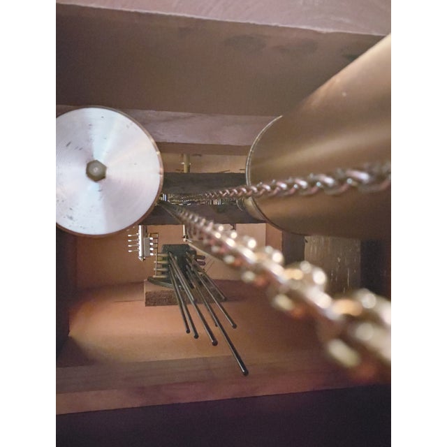 Hand-carved walnut, Italian artisans. Prestigious mechanism with chimes and chimes. (The clock and mechanism are...