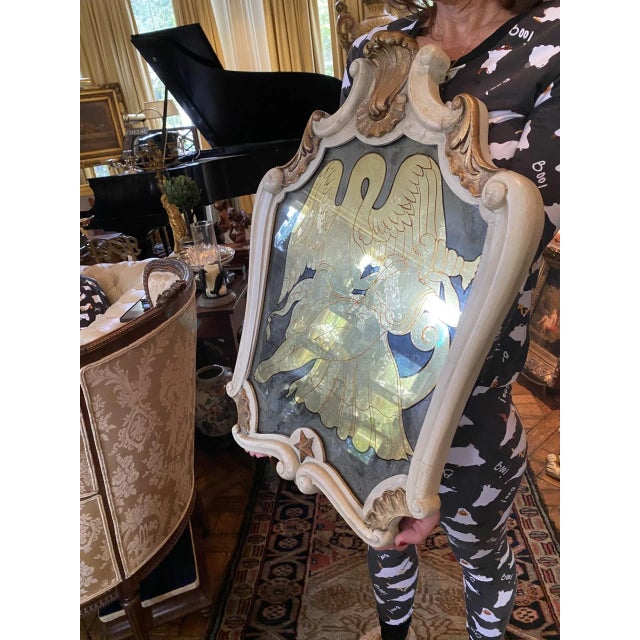 This is one in a spectacular suite of six rare Maison Jansen exquisitely stylized wall mirrors of the most versatile...