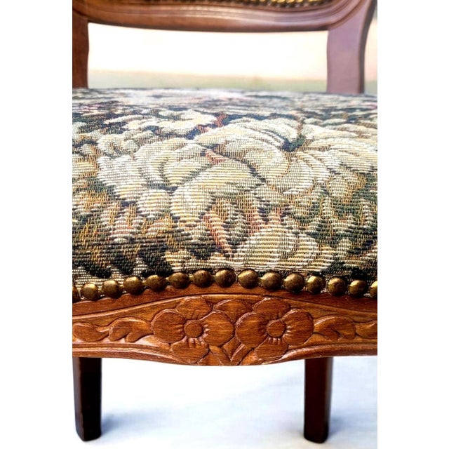 Antique French Provincial Armchairs 19th century — Pair of Carved wood Fauteuils with Floral Tapestry Bring the romance of...