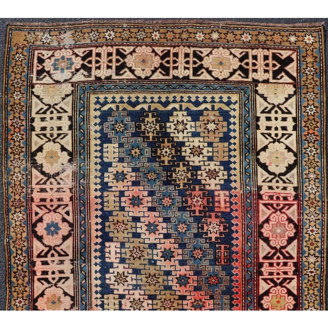 Antique Caucasian Shirvan rug with all-over blossoming tribal motifs. Keivan Woven Arts / rug V21-0102, country of origin...