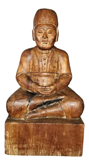 Early 20th Century Indonesian Carved Wooden Seated Gentleman