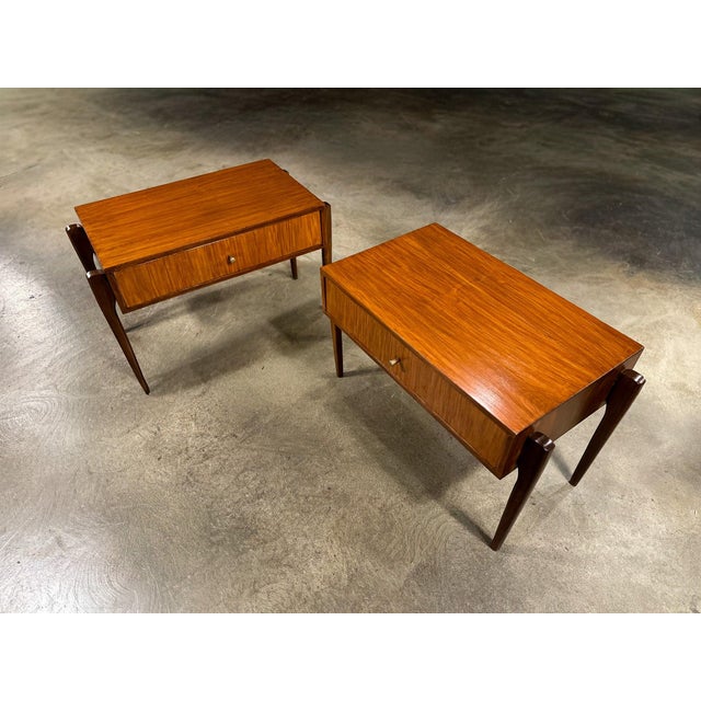 This refined pair of nightstands was produced in Brazil during the 1950s by an as-yet unidentified designer, and stands as...