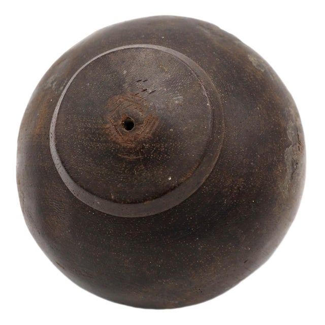 An old spinning top from Indonesia.