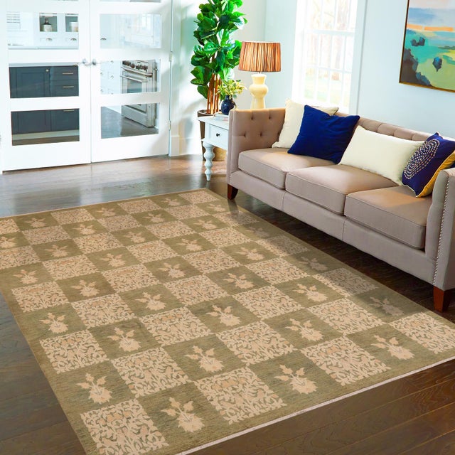 "Enhance the ambiance of your home with this magnificent Persian-influenced Turkish hand-knotted rug made by skilled...