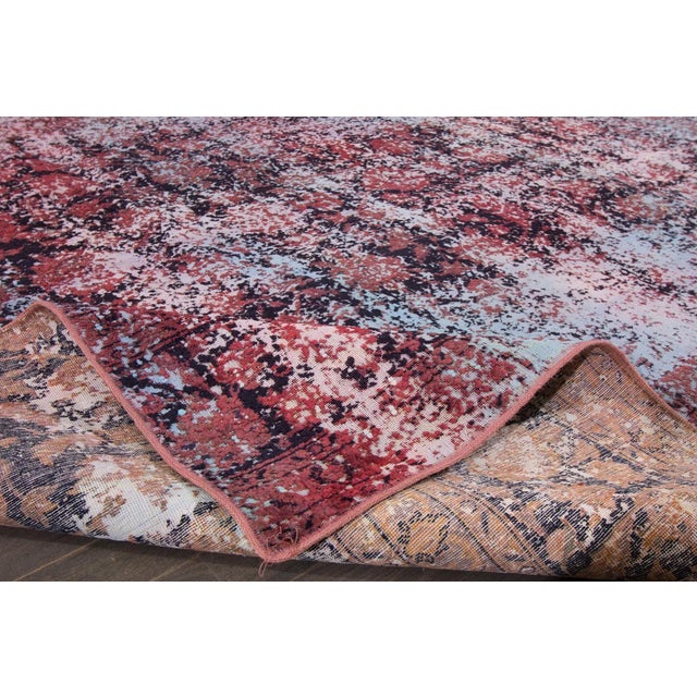 Vintage hand-knotted Overdyed rug with an all over motif. This piece has great detailing and a beautiful design. It would...