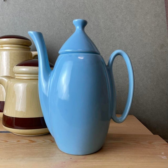 Lot includes three items: Coffee/tea pot and a teapot/milk jug by the Portuguese porcelain manufacturer SADO, now defunct....