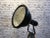 This industrial reflector stands on a wooden tripod and was produced during the 1950s in former Czechoslovakia. It is...