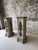Impressive pair of monumental vintage wood pedestals featuring an octagonal column form, stepped plinth bases, and richly...