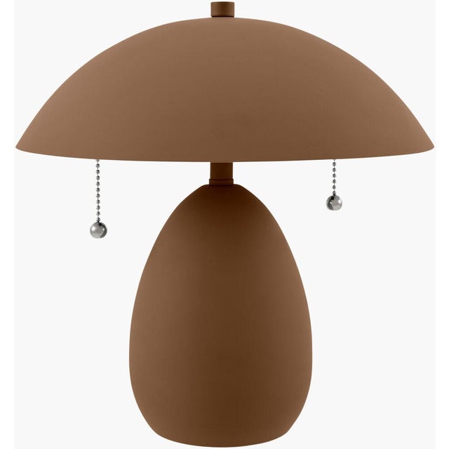 Illuminate your space with the charming allure of the Umberis accent table lamp, a perfect embodiment of traditional...