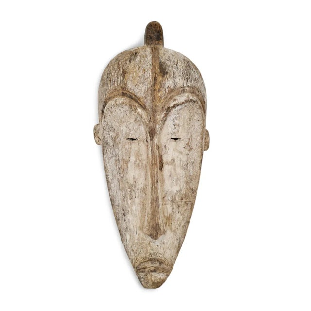 Original Fang Ngil mask from Gabon. Signs of age and use. Traditionally thin elongated and elegant nose, and white pigment.