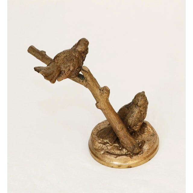 Pair of sparrows on a branch Animal bronze sculpture, produced 1910/30. Two sparrows, one perched on a branch....