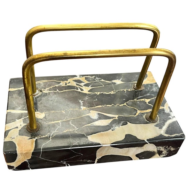 A striking vintage desk accessory crafted from richly veined black Italian marble with dramatic warm caramel and ivory...