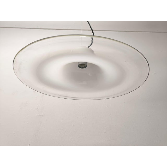 Murano Glass Disc Suspension, 1970s, in Very Good conditions. Designed 1970 to 1979 Up to 250V (Europe/UK Standard).The...