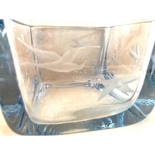 Strombergshyttan crystal art glass vase. Pale ice blue with etched flying geese around the perimeter. There are two scenes...