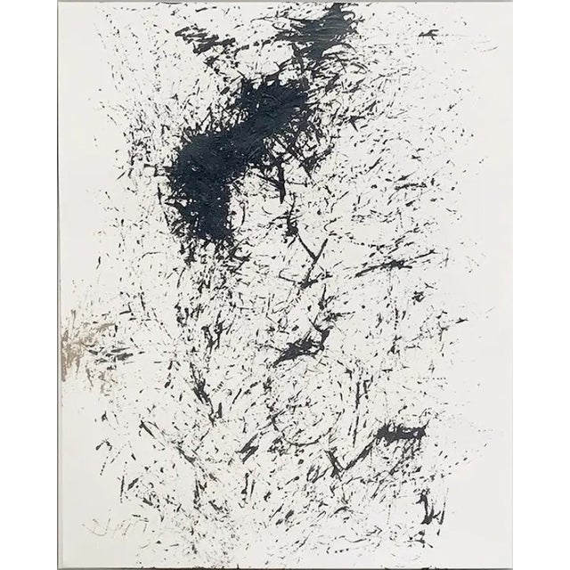 Modern abstract black and white artwork featuring expressive ink splatter and gestural mark-making on a light ground....