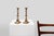 This pair of French copper candlesticks from around 1900 embodies rustic elegance with a touch of timeless simplicity. The...