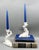 Stunning pair of white dolphin candlesticks by Fitz and Floyd. Asian inspired pieces from the late 20th century. Each...