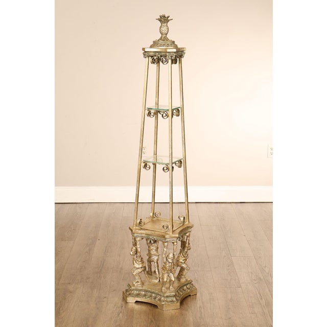 High Quality Figural Gilt Metal Pedestal Stand Featuring A Tall Openwork Frame With Multiple Glass Display Shelves. The...