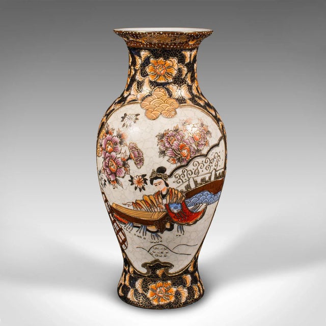 This is a small vintage Satsuma vase. A Chinese, ceramic baluster urn with Oriental taste, dating to the mid 20th century,...