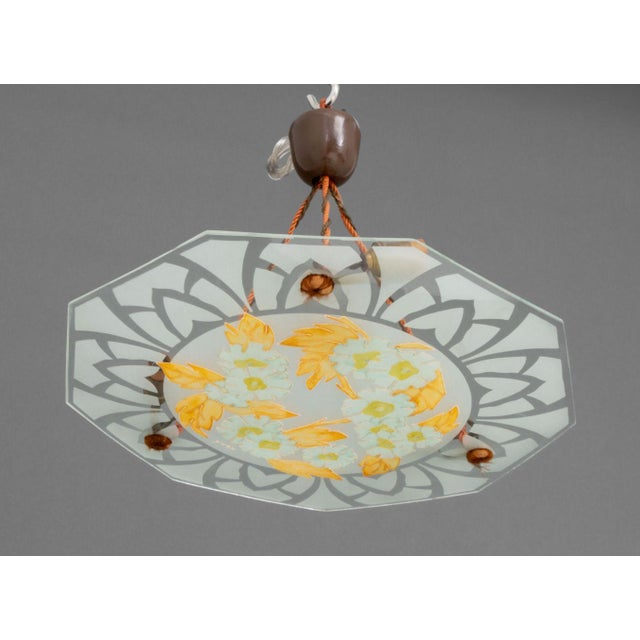 French Art Deco Polychrome Painted Glass Plafonnier, the octagonal form with four lights and signed "Yvon". 11" H x 17.25"...