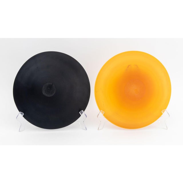 Four Murano Frosted Glass Bowls, two colorless, one black, and one amber glass. Largest: 2.75" H x 12.75" Diameter....