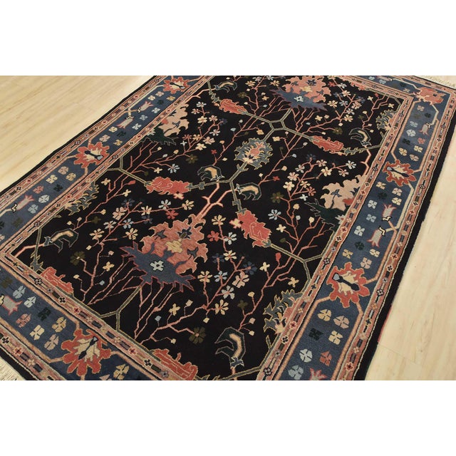 An authentic vintage traditional Heriz rug hand-knotted with fine wool on a cotton foundation. This rug features a...