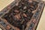 An authentic vintage traditional Heriz rug hand-knotted with fine wool on a cotton foundation. This rug features a...