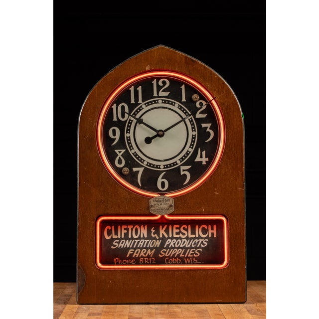 c. 1930s; Electric Ad Clock Co. - Chicago Vintage neon-accented wall-mount advertising clock. This unique piece doesn't...