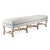 Bench with scrolled spindles with removeable cushion upholstered in natural linen.