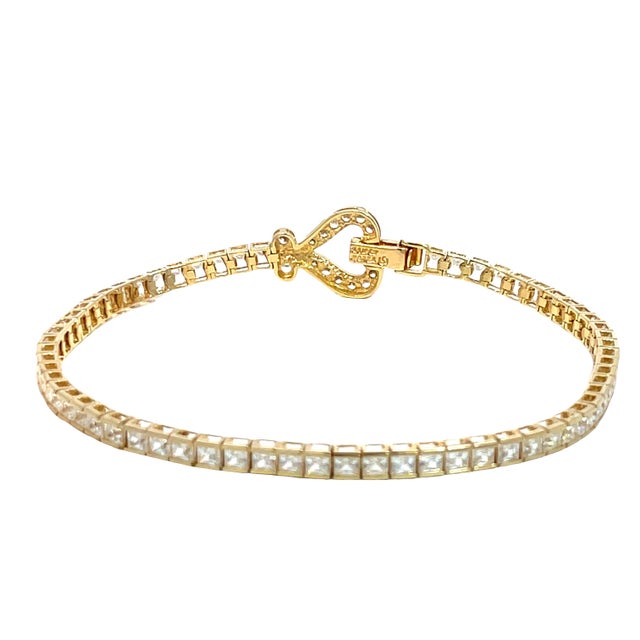 Metal 14k Yellow Gold Cz Tennis Bracelet With Heart Clasp For Sale - Image 7 of 8
