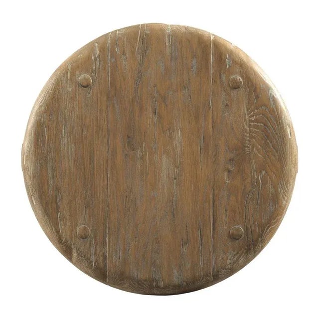 A lovely low table with a planked oak top over four organically shaped legs and stretchers. Care Instructions: Wipe with a...