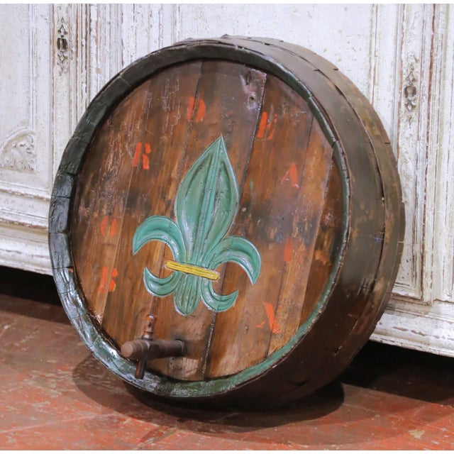 Bring authentic French country character to a wine cellar, kitchen, or tasting room with this antique decorative barrel...