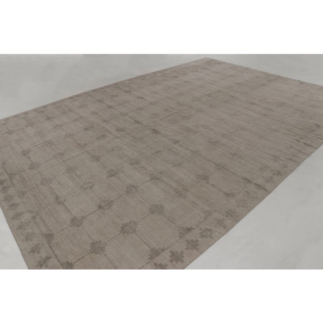 Handwoven in cotton, this 12x18 contemporary oversized rug joins Rug & Kilim’s Dhurrie collection, featuring a minimalist...