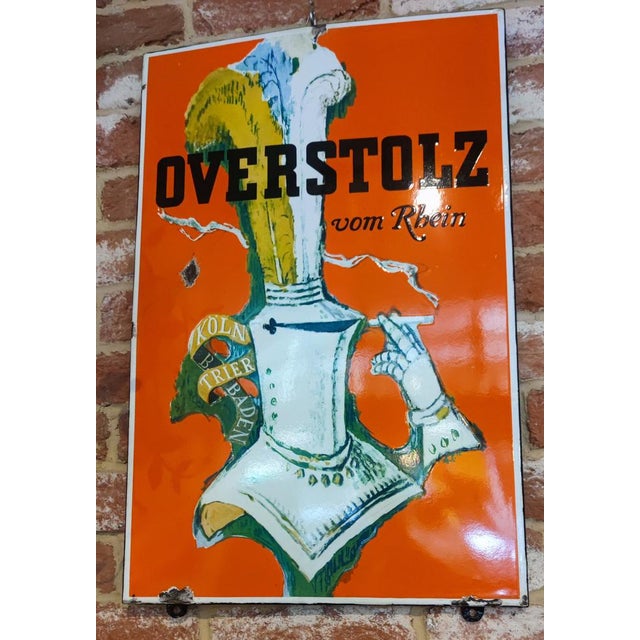German enamelled sign from the 1950s of a German cigarette brand with some signs of aging.